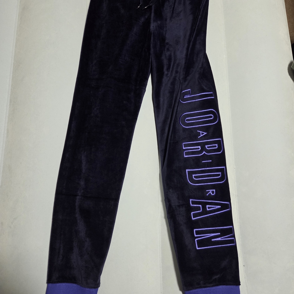 Large Girls jordan purple blue pants.